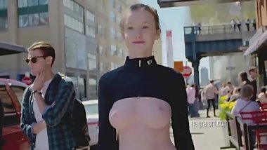 Emily Bloom walks topless in public in NYC