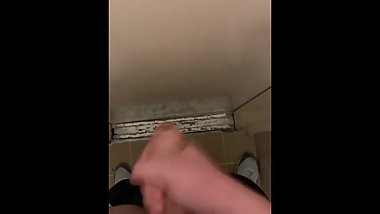 Teen in school bathroom