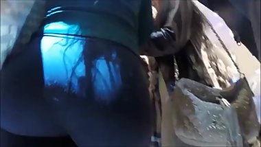 Candid blonde with great butt in leggings