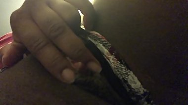 Masturbating