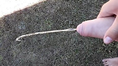 Teen pissing in backyard