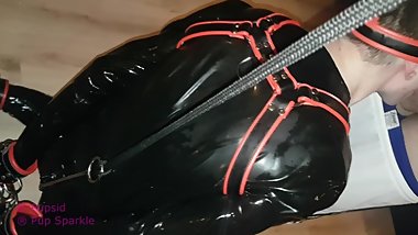 Sucking masters dick while bound and in latex
