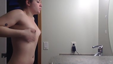 Roommate caught on hidden spy cam getting dressed for class