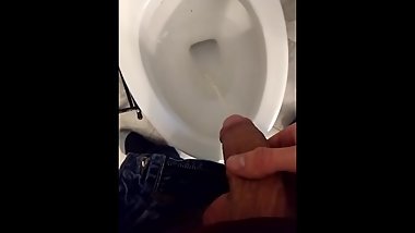 Guy pissing.